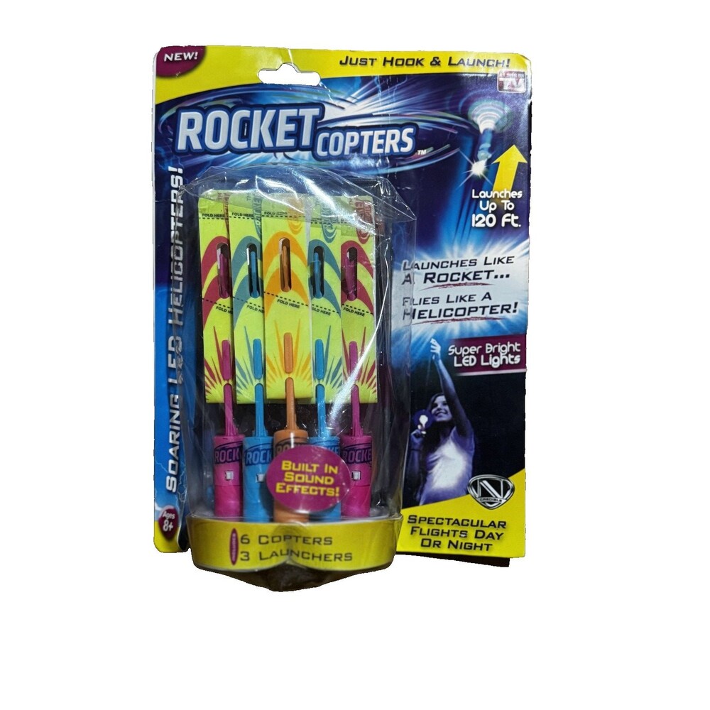 Rocket Copters As Seen on TV LED Slingshot Helicopters Light Up Flying Toy NEW